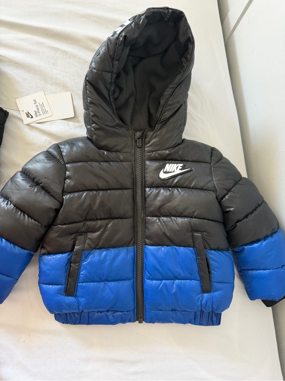 Nike kids Black Puffer Jacket with Blue Trim